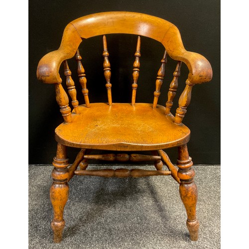 80 - A Victorian Elm and Beech ‘Captain’s’ armchair, or Smoker’s bow (originally from Chesterfield Police... 