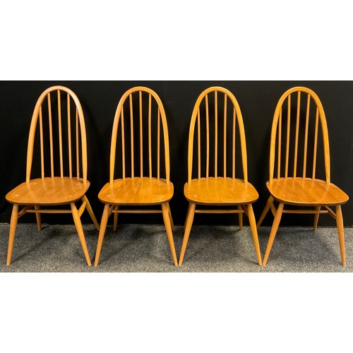 86 - A set of four ‘Windsor’ design dining chairs, by Lucian Ercolani for Ercol, high hoop-backs, turned ... 