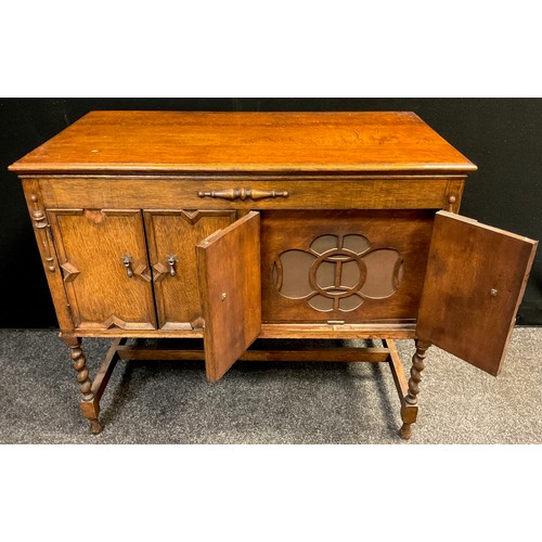 91 - A Garrard RC 120 Mk. II four speed ‘Record changer system’ turn-table, c.1958, in an oak cabinet, 76... 