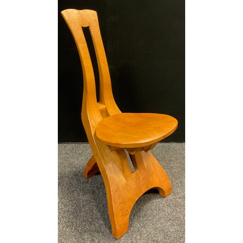 92 - A Brutalist style folding oak chair, in the manner of De Puydt, 90.5cm high x 41cm wide x 51cm deep ... 