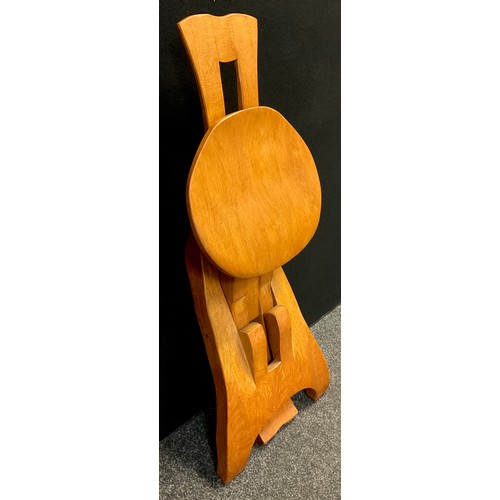 92 - A Brutalist style folding oak chair, in the manner of De Puydt, 90.5cm high x 41cm wide x 51cm deep ... 