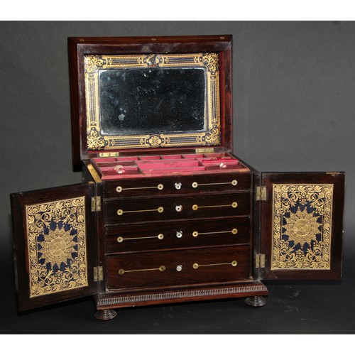 2141 - A William IV rosewood and mother-of-pearl marquetry table-top work cabinet, hinged top enclosing a c... 