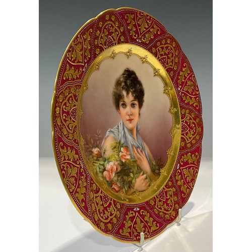 181 - A Vienna shaped circular cabinet plate, painted by Wagner, signed, decorated with the portrait of a ... 
