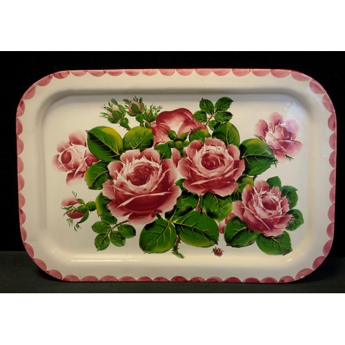 124 - Wemyss Ware ceramic tray, hand-painted with pink roses and a decorative border, 37cm long