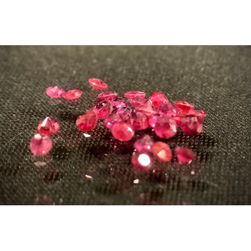 420 - Loose Gemstones, twenty eight round cut rubies, total estimated stone weight approx 1.71ct.