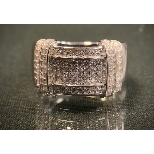 444 - A cubic zirconia signet ring, pave set with white stones, stamped 925, size P, 6.9g gross