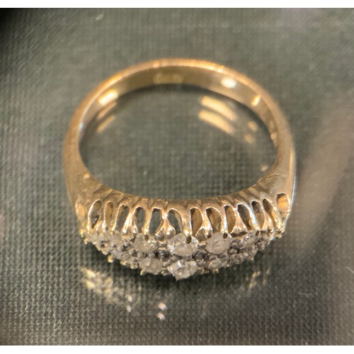 457 - A diamond ring, set with twelve old and brilliant cut diamonds, total estimated diamond weights 
app... 