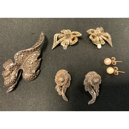 466 - A pair of 9ct gold cultured pearl earrings, boxed; a marcasite leaf brooch; two pairs of marcasite c... 