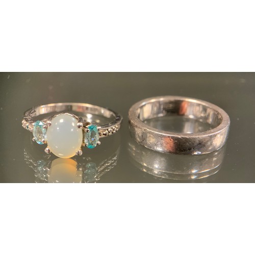 467 - A 925 silver opal cabochon and blue cz dress ring others, white Topaz, Cz, copal amber etc, part mar... 