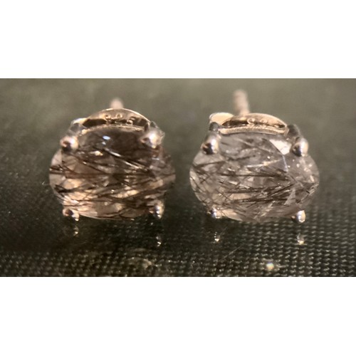 476 - A pair of oval rutilated quartz stud earrings, silver mounts, 1.4g gross