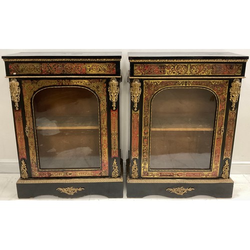 2175 - A pair of 19th century gilt metal mounted Boulle and ebonised pier display cabinets, each with an ov... 