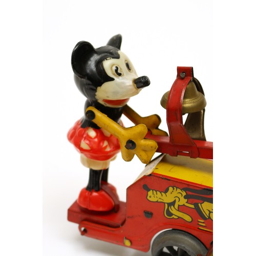 118 - Walt Disney and Mickey Mouse Interest - a Wells O Gauge tinplate and clockwork novelty Mickey Mouse ... 