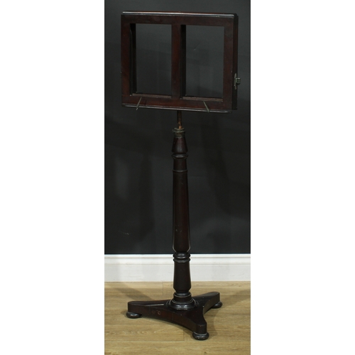 2176 - A 19th century mahogany music stand, turned column, incurve triform base, bun feet, 113cm raising to... 