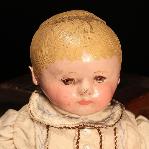 143 - Americana - an early 20th century Martha Chase cloth doll, the head with painted features including ... 