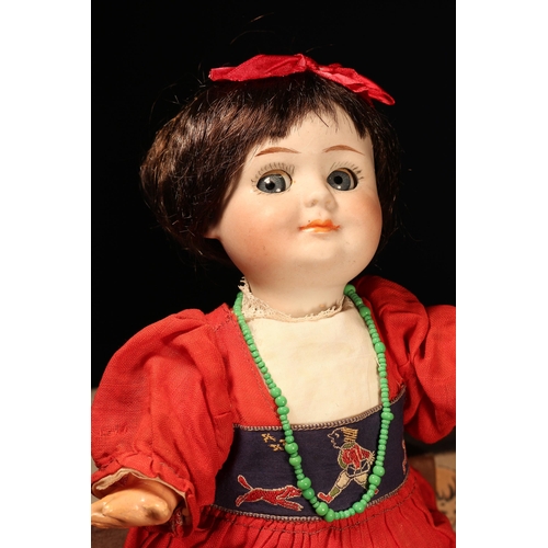 145 - A Gebrüder Heubach (Germany) bisque head novelty Googly-eyed doll, the bisque head with painted feat... 