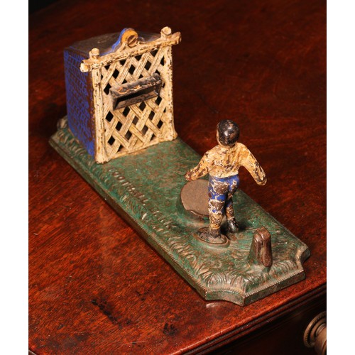 216 - Sporting Interest - a late 19th century painted cast iron novelty mechanical money box or bank, Foot... 