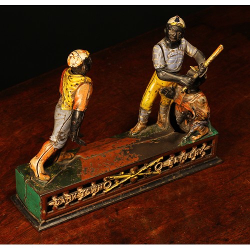 214 - Americana, Sporting Interest - a late 19th century painted cast iron novelty mechanical money box or... 