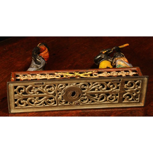 214 - Americana, Sporting Interest - a late 19th century painted cast iron novelty mechanical money box or... 