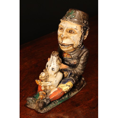 212 - Americana - a late 19th century painted cast iron novelty mechanical money box or bank, Paddy and th... 