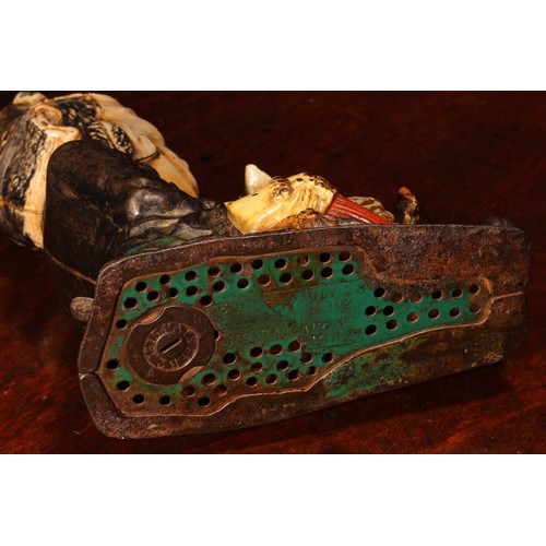 212 - Americana - a late 19th century painted cast iron novelty mechanical money box or bank, Paddy and th... 