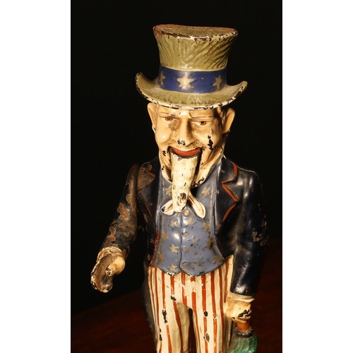 210 - Americana - a late 19th century painted cast iron mechanical money box or bank, Uncle Sam Bank, mode... 