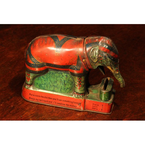 220 - An early 20th century novelty tinplate money box or bank, Royal Trick Elephant Bank, modelled as a E... 