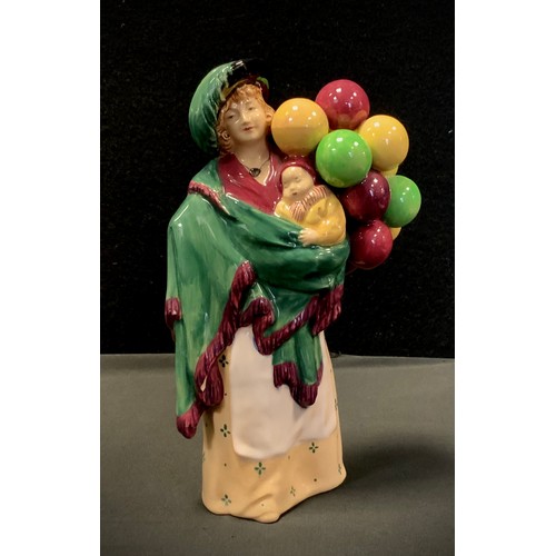 4 - A Royal Doulton figure, 'The Balloon Seller' HN 583,4-7-29, printed and impressed marks, 22cm high