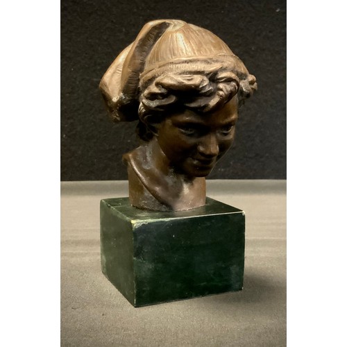 6 - A bronzed metal bust, Boy with cloth cap, black stone plinth, 12.5cm high