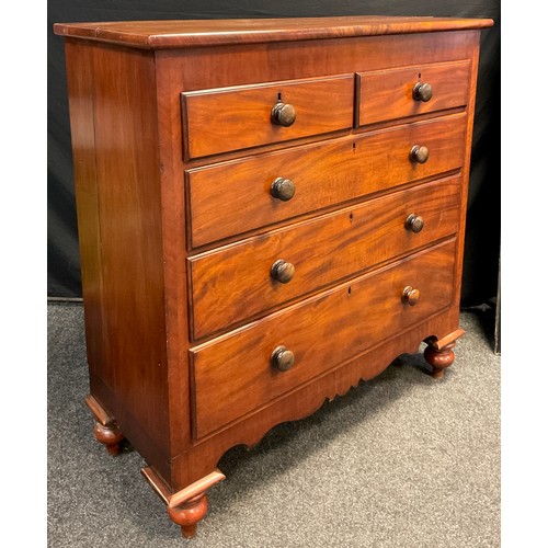 32 - A Victorian mahogany chest of drawers, over-sailing rounded rectangular top, over two short and thre... 