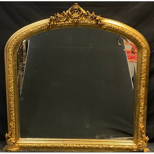 44 - A large gilt framed over mantle wall mirror, ornate arched top, approx 131cm x 125cm