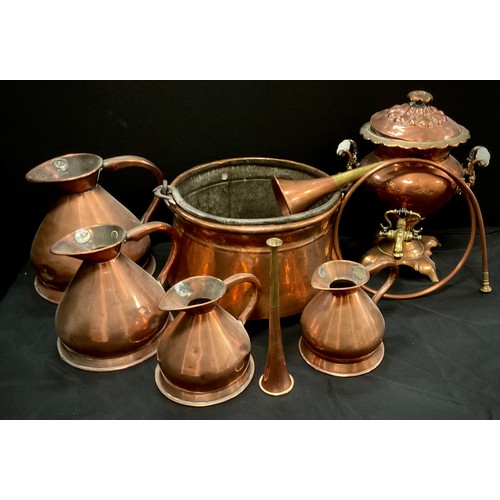 45 - Copper - A Copper samovar, twin porcelain handles, large jam pan, a set of three graduated haystack ... 
