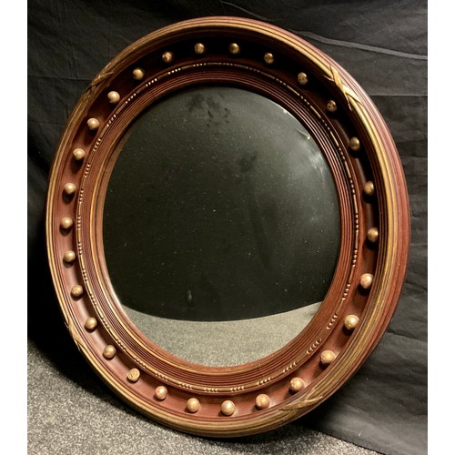 48 - A large reproduction Regency style convex wall mirror, 77.5cm diameter frame size.