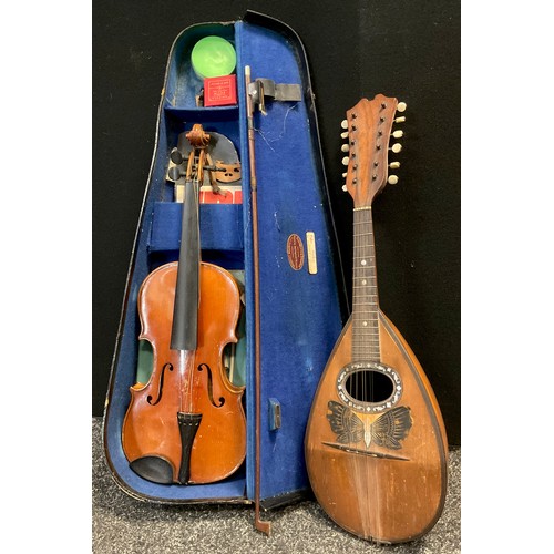 57 - Musical instruments - a 3/4 size student’s violin, cased;  and a mid 20th century Mandolin, bone tun... 