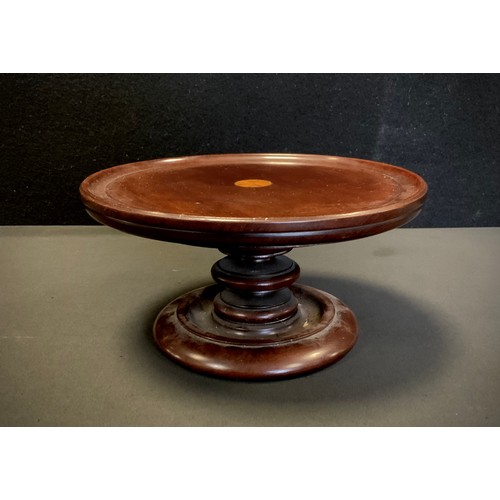 64 - An Edwardian mahogany and marquetry circular lazy Susan, of small proportions, dished circular plate... 