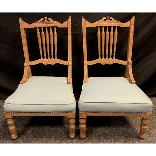 82 - A pair of Edwardian Nursery chairs, (2).