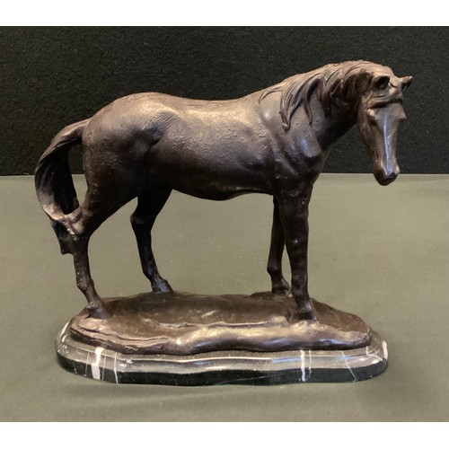 84 - A bronzed metal model Standing Horse, black marble plinth, 22cm high