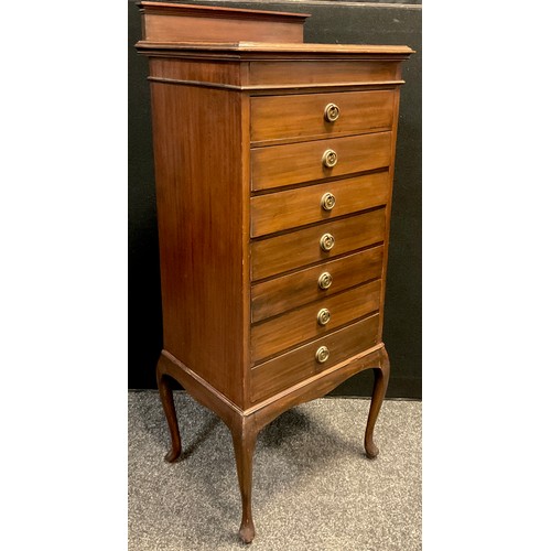 110 - An Edwardian mahogany music cabinet, quarter galleried back, seven drawers, 118cm high x 50cm wide x... 