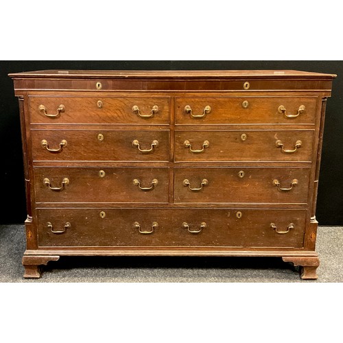 117 - A George III oak Lancashire Mule Chest, hinged top above two pairs of faux drawers, two short drawer... 