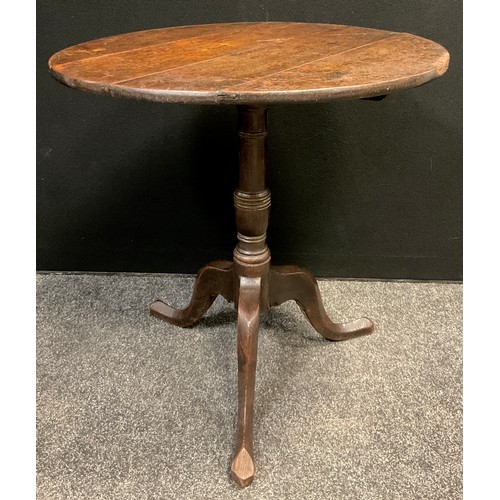 119 - A George III oak tripod occasional table, 71cm high x 71.5cm diameter.