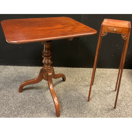 122 - A 19th century mahogany tilt-top tripod table, rounded rectangular top, turned pedestal base, 73.5cm... 