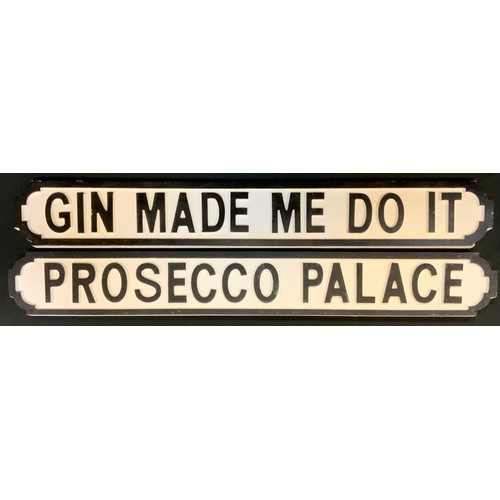 113 - A pair of novelty carved wood 'Street' type signs - 'Gin made me do it', and Prosecco Palace', measu... 