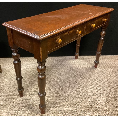 145A - A Victorian ‘mahogany’-stained wood hall table / console table, over-sailing rounded rectangular top... 