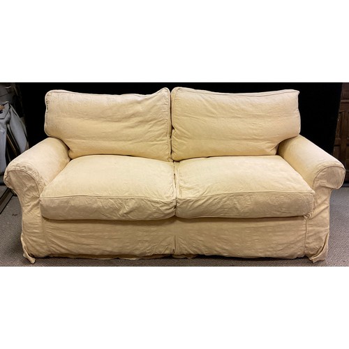 287 - A good quality three seat sofa and conforming armchair, down filled, the sofa measuring 192cm high x... 