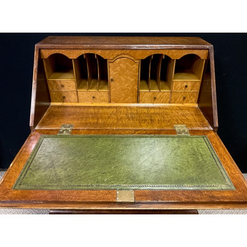 293 - A reproduction George III Bird’s-eye Maple veneered bureau, the fall top enclosing a fitted interior... 