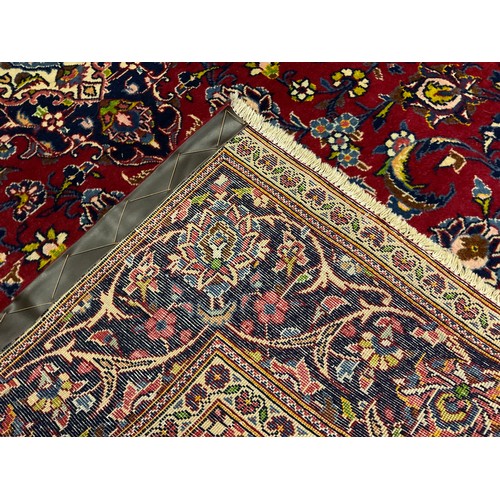 342A - A Central Persian Kashan rug / carpet, knotted in rich tones of red, blue, deep indigo, green, and c... 