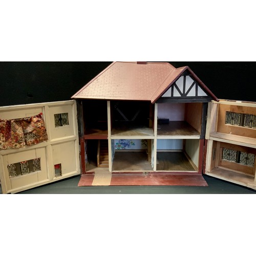 363 - A mid 20th century two storey dolls house, approx 58cm x 65cm x 48cm.