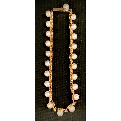 514 - A 9ct gold cultured pearl and floral link bracelet, stamped 375, 10k, Qvc, 8.2g gross