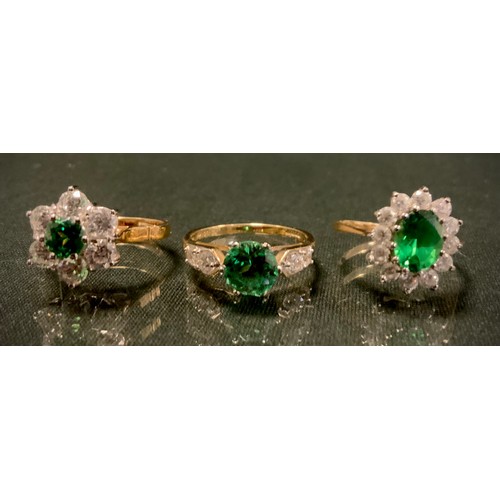 536 - A 14c gold DQCZ emerald and diamond effect snowflake cluster dress ring, other oval cluster, etc, si... 