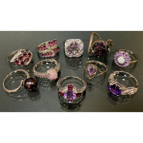 552 - Gemporia - a Bixbite and Burmese Ruby sterling silver ring,  others, amethyst and white topaz, Eudia... 