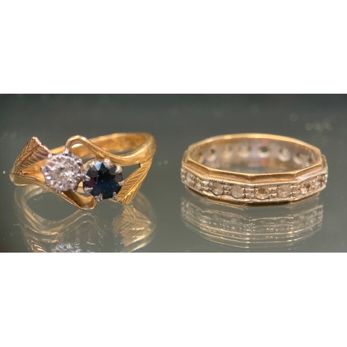 559 - A diamond and sapphire ring, 18ct gold shank, size L/M, 3.8g gross,  9ct yellow and white gold etern... 